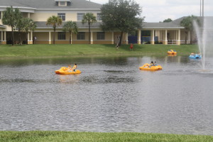Campers playing in the lake at Eagles Landing