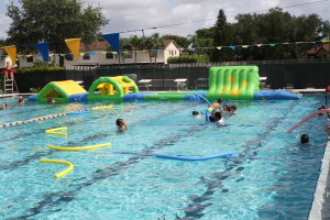 Campers playing in the pool at Eagles Landing